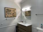 Freshen Up Before Your Next South Haven Adventure in the Main Level Bath